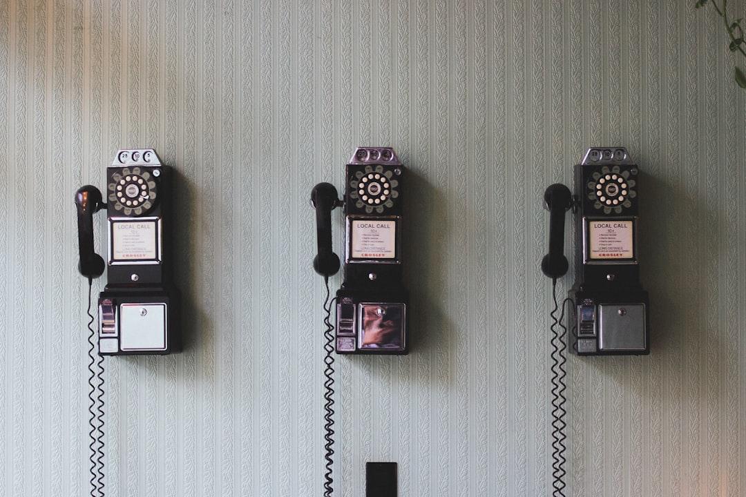 Minimalist photography of three crank phones from Pavan Trikutam on Unsplash