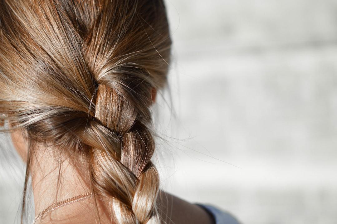 Woman with braid hair from Tamara Bellis on Unsplash