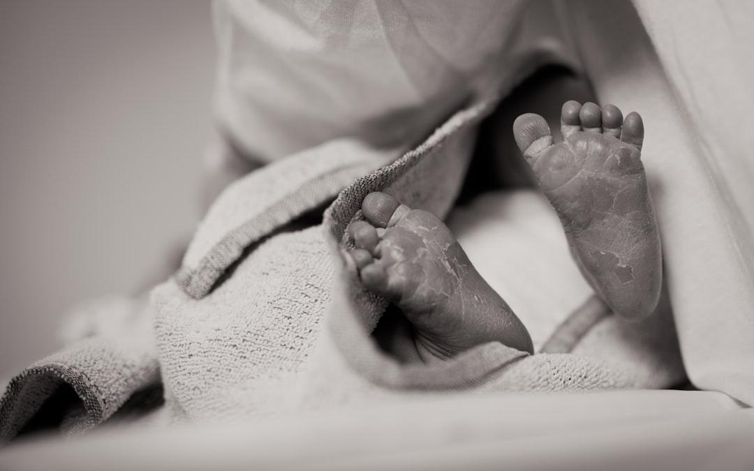 A baby's feet. from 🇸🇮 Janko Ferlič on Unsplash