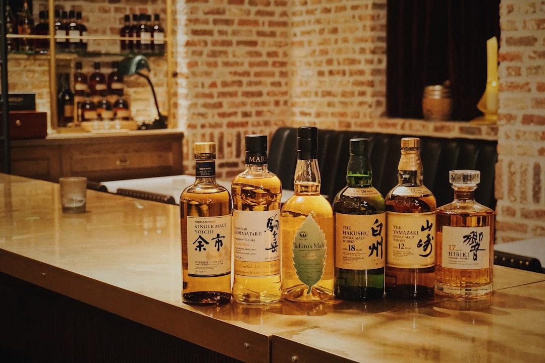Six liquor bottles from Yuri Shirota on Unsplash