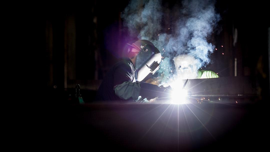Person welding metal using gray helmet from Pete Wright on Unsplash Đại Cương về Bát cương