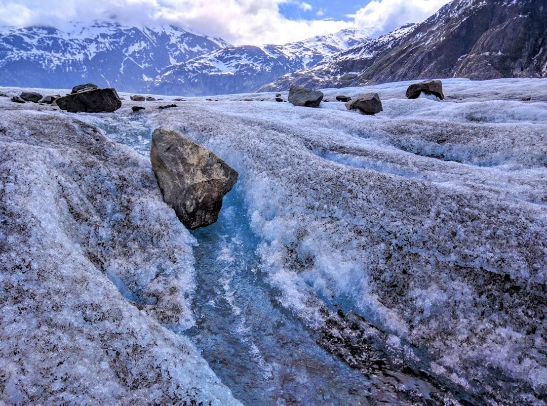 Ice glacier with boulder on top near mountains from Matt Gross on Unsplash An toàn từ cho đến nhận