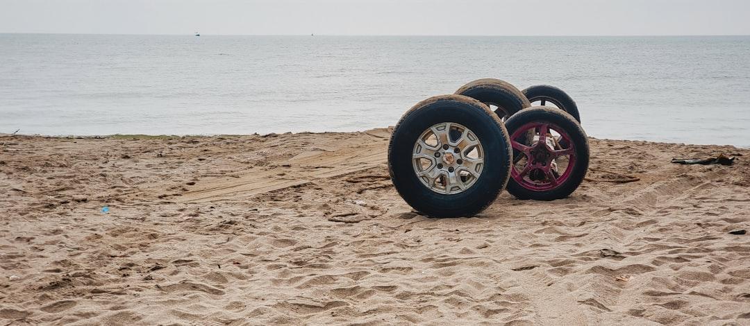 A couple of tires sitting on top of a sandy beach from Aoi on Unsplash Thanh Hoá: Chữa bệnh miễn phí cho trẻ em
