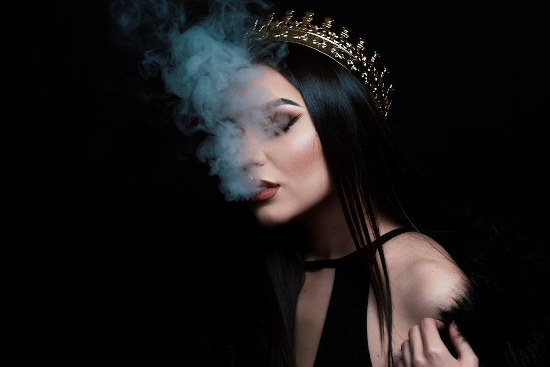 Smoke coming out from woman's mouth from Alex Mihai C on Unsplash Tin ảnh Sức khỏe