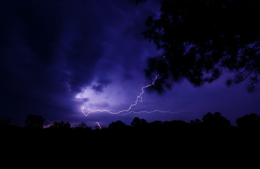 Lighting in sky during nighttime from NOAA on Unsplash Dịch bệnh gia tăng