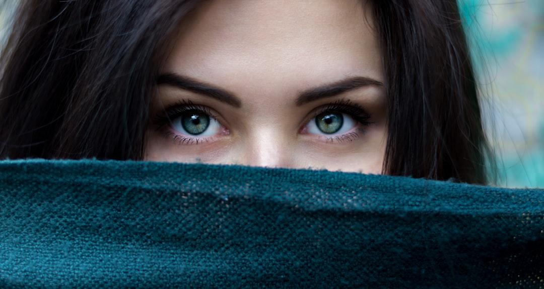 A close up of a person with blue eyes from Alexandru Zdrobău on Unsplash
