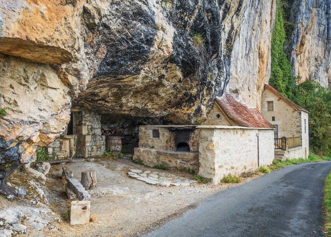 An old stone house built into the side of a cliff from Free Nomad on Unsplash