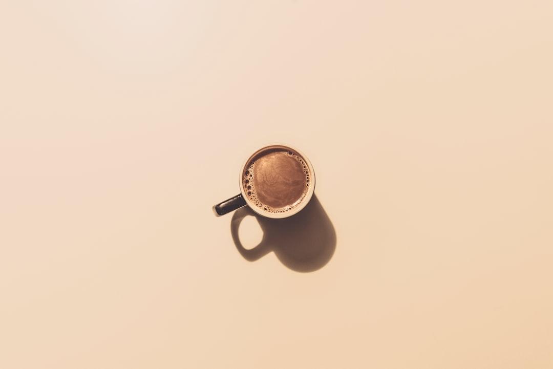 Brown ceramic teacup from Jakub Dziubak on Unsplash