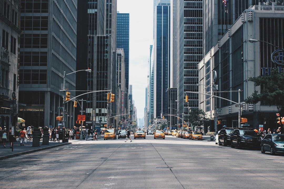 Pathway between high rise buildings from Andrea Cau on Unsplash