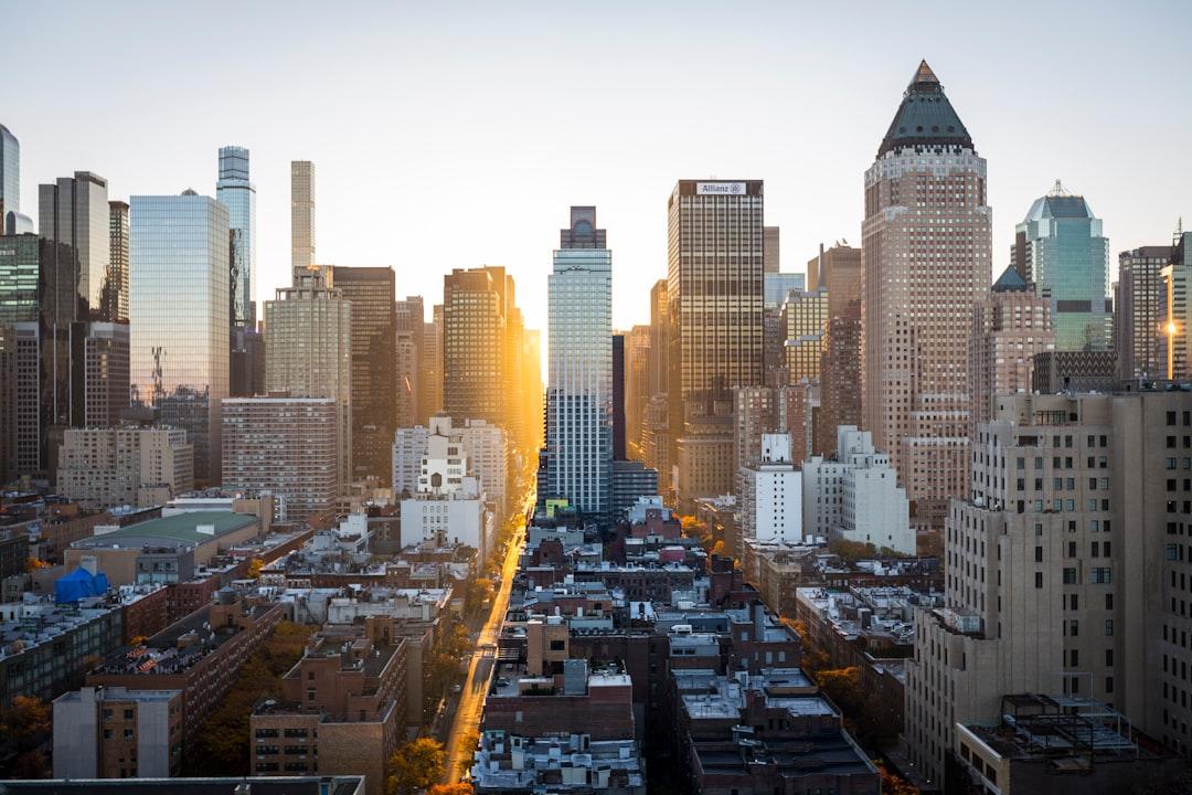 High rise buildings city scape photography from ben o'bro on Unsplash