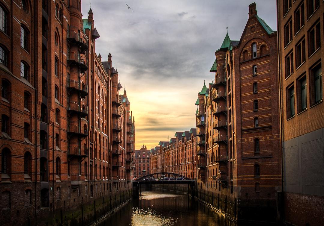 River between brown concrete buildings from Meduana on Unsplash