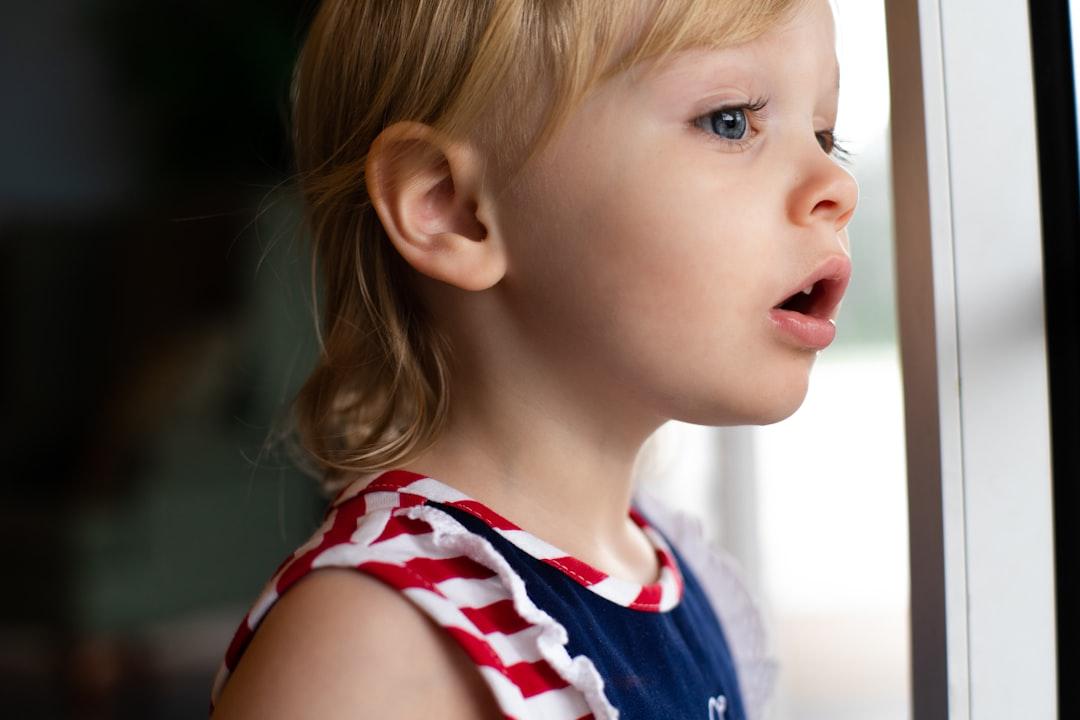 Girl in blue and white tank top from Jeremiah Lawrence on Unsplash