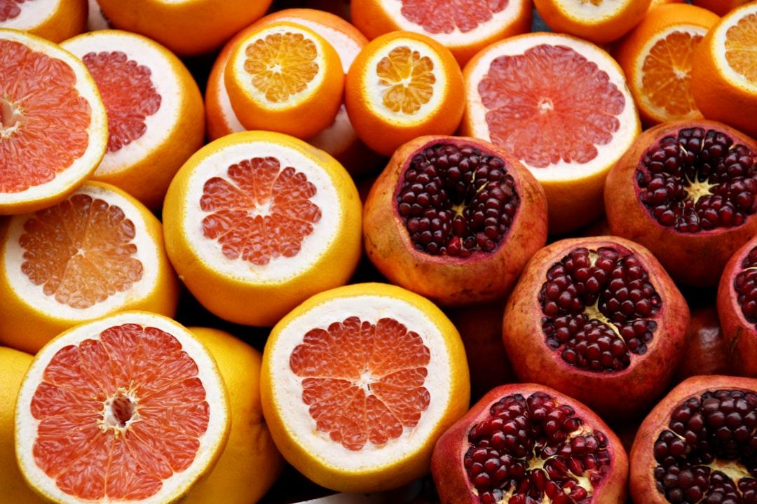 Pomegranate and orange fruits from Isra E on Unsplash Multivitamin làm giảm nguy cơ ung thư