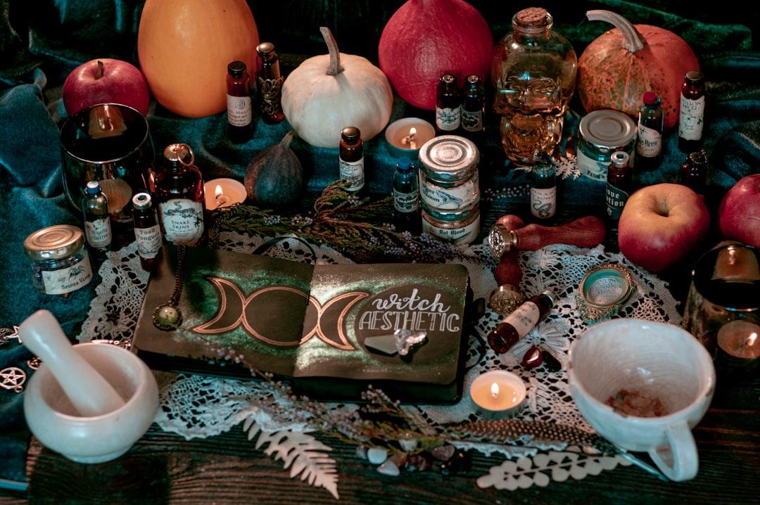 A table topped with lots of different types of items from Elena Mozhvilo on Unsplash Tác dụng thần kì của giấm táo