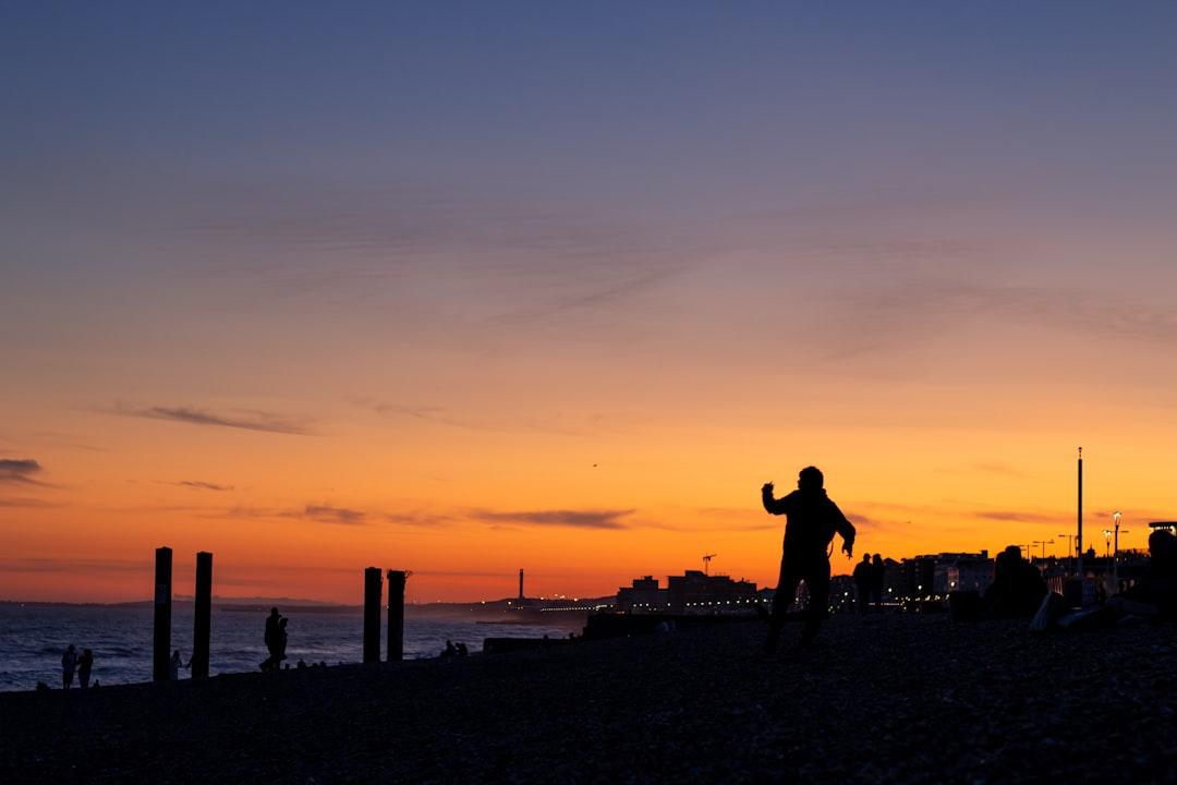 A person standing on a beach at sunset from Veerle Contant on Unsplash Pyridoxin (B6)
