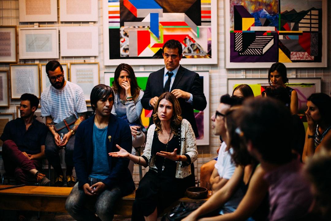People meeting in room from Antenna on Unsplash Dinh dưỡng và ung thư