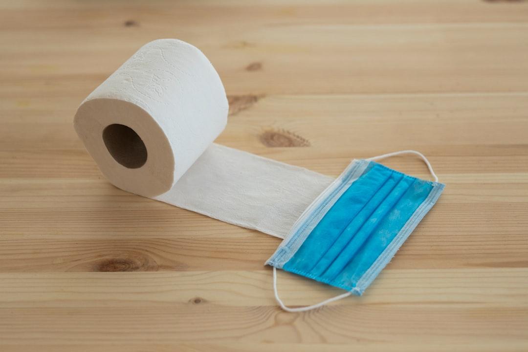 White toilet paper roll on brown wooden table from engin akyurt on Unsplash UNG THƯ VÒM  MŨI HỌNG